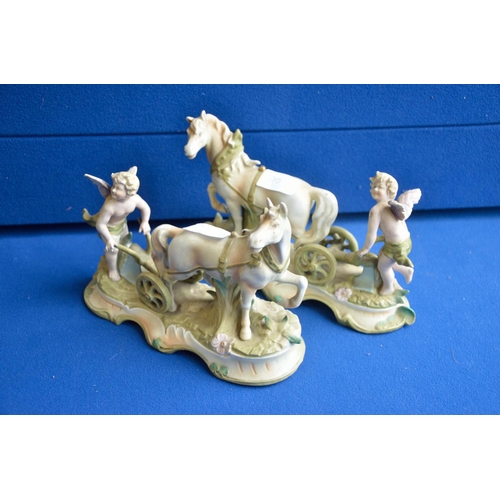 90c - Pair of continental porcelain horse and cart figures