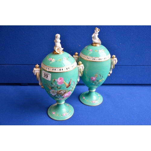 99 - Pair of green continental pedestal urns 33cm