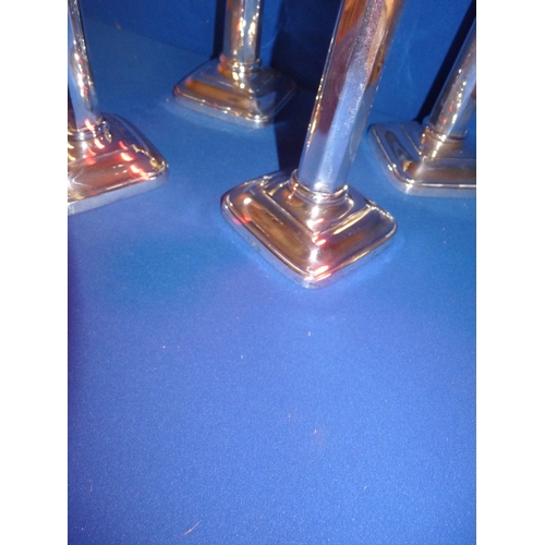 400a - A set of 4 solid silver Sheffield candlesticks