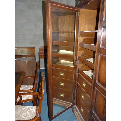 644 - Oak triple wardrobe with shelves