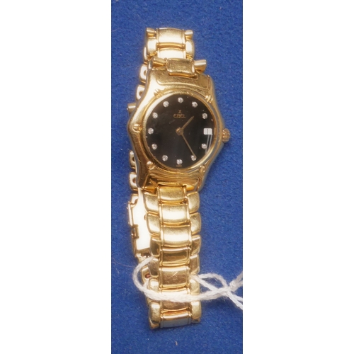 400k - Ladies EBEL 18ct gold wristwatch with black face and diamonds 10years old very heavy working order .... 