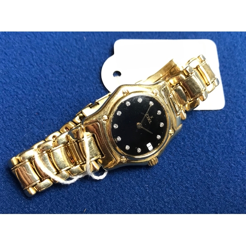 400k - Ladies EBEL 18ct gold wristwatch with black face and diamonds 10years old very heavy working order .... 