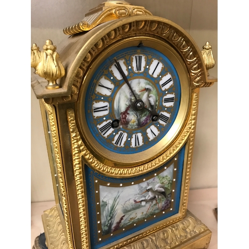 281 - Turquoise and gold French mantle clock and matching ewer