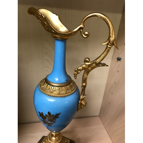 281 - Turquoise and gold French mantle clock and matching ewer