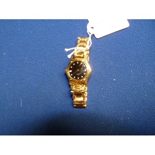 400k - Ladies EBEL 18ct gold wristwatch with black face and diamonds 10years old very heavy working order .... 