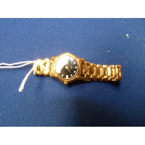 400k - Ladies EBEL 18ct gold wristwatch with black face and diamonds 10years old very heavy working order .... 