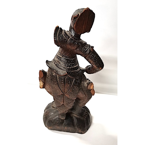 468 - An early Oriental Wooden Warrior 46cm