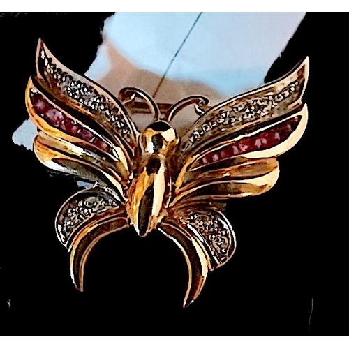 691 - 9ct gold ruby and diamond butterfly brooch set in yellow and whire gold