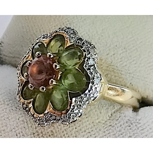 692 - 9ct gold 375 ring designer basket with green stones and pink1/2 ct centre stone edged in white stone... 