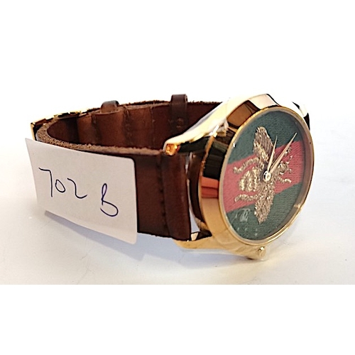 702b - Mans Gucci watch 126.4 water resistant on brown leather strap working order good condition original ... 