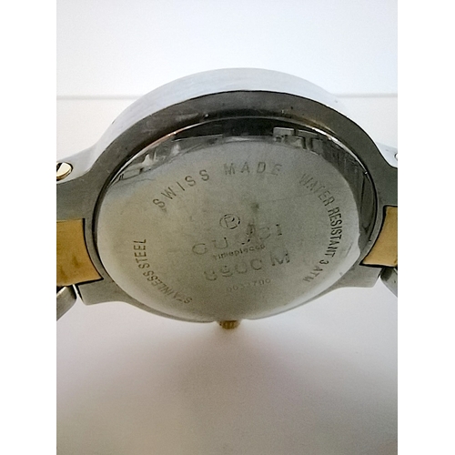 702c - Gucci mans watch needs battery 8900 model bi metal