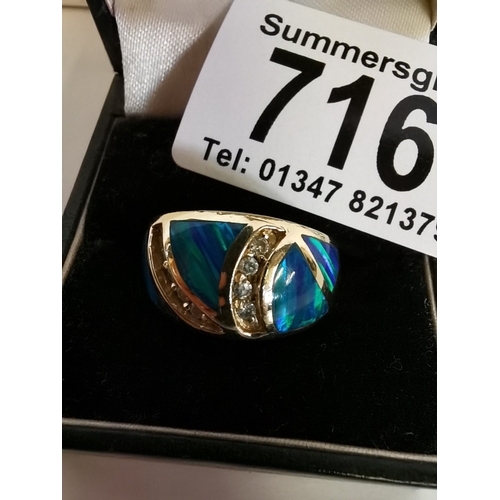 716 - Black Opal and diamond ring on 14 k gold excellent ring size N 9g