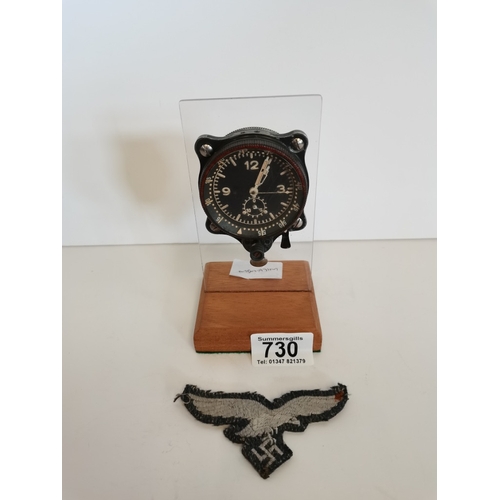 730 - WW2 German Luftwaffe Aircraft clock used in a Messerschmitt 109 aircraft plus Luftwaffe cloth badge