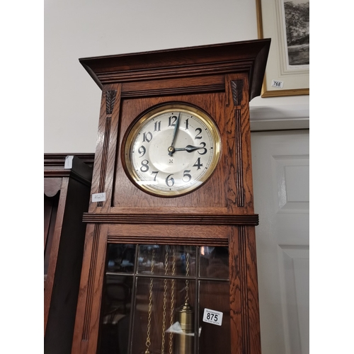 875 - Oak longcased double weight clock