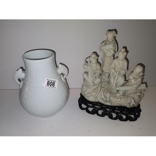 808 - Twin handled 19th Century Blanc de Chine vase and Chinese group figure