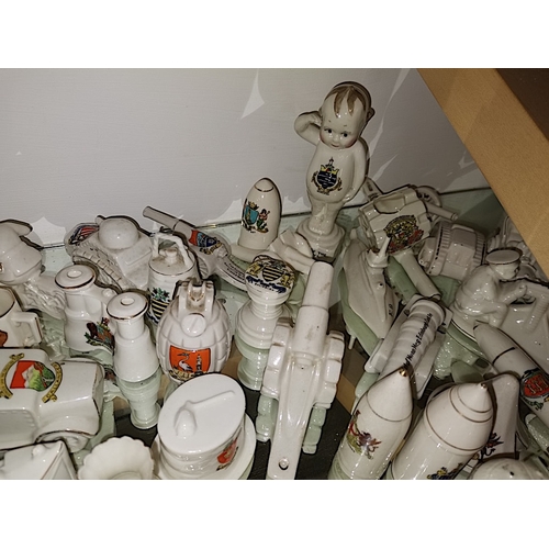 565 - A excellent collection of War memorabilia crested figures approx 65 ( Carlton Ware, Goss, Arcadian e... 