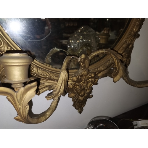 903 - Pair of Antique gilt mirrors with candle sconses
The age will be 1820-60 size 85cm x 50cm.

Slight d... 