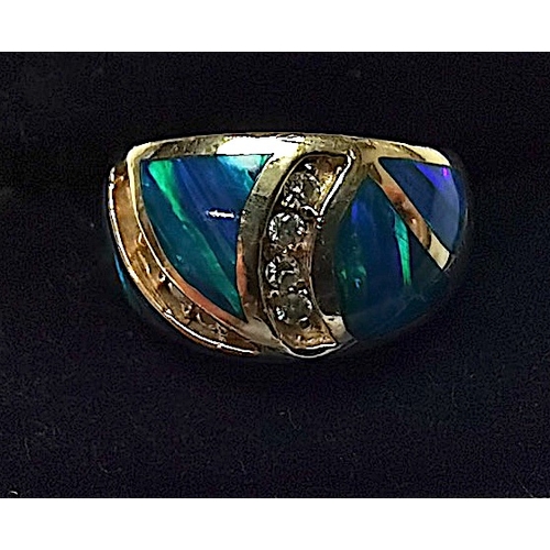 716 - Black Opal and diamond ring on 14 k gold excellent ring size N 9g