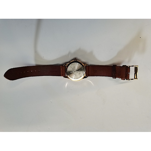 702b - Mans Gucci watch 126.4 water resistant on brown leather strap working order good condition original ... 