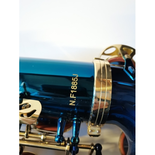 489 - A snazzy coloured blue coloured Saxophone by Stagg in case  slight chips to rear paint work oth... 