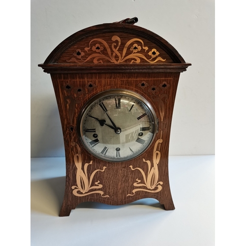 470 - Oak Deco Mantle Clock with Copper Inlay and 5 chimes marked 142702 with key and pendulum height 45cm... 