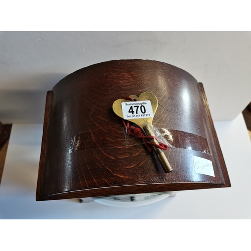 470 - Oak Deco Mantle Clock with Copper Inlay and 5 chimes marked 142702 with key and pendulum height 45cm... 