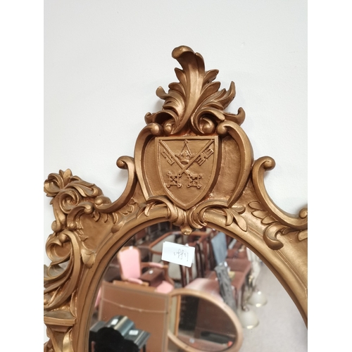 831 - Pair of Gilt wall mirrors with St Peters Emblem