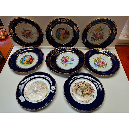 834 - 2x animal decoration plates and 7 cherub decoration plates