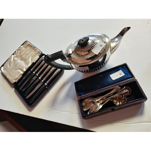 637b - Silver miscellaneous spoons 104g and plated teapot and cake knives