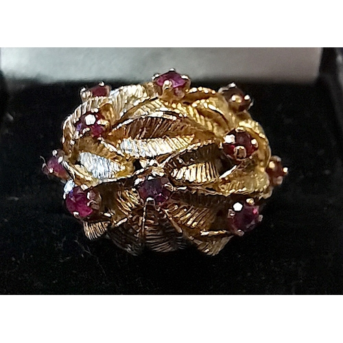 675 - 9ct Yellow gold designer ring stamped HB.  Leafs wit 10 pink stones heavy ring size M