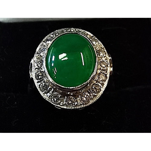 675b - 18ct ring yellow gold with 5ct Coubochon green centre stone encrusted with white diamonds size N