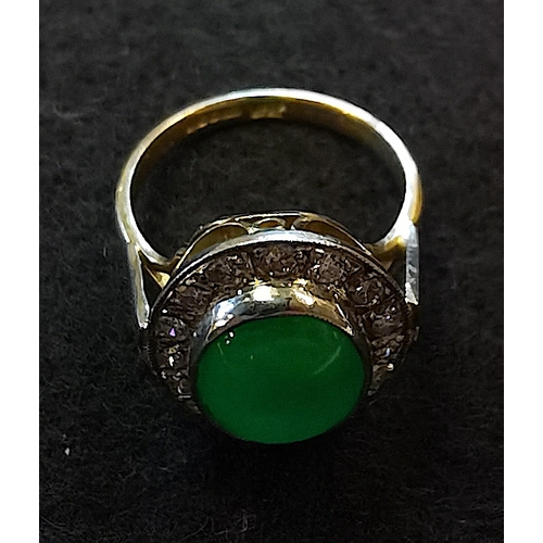 675b - 18ct ring yellow gold with 5ct Coubochon green centre stone encrusted with white diamonds size N