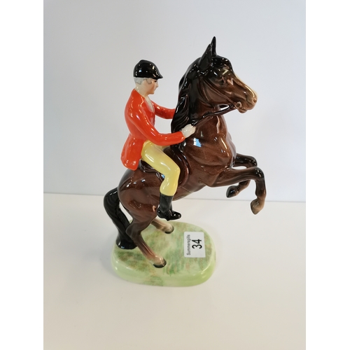 34 - Beswick Rearing huntsman early version style 1 orange jacket and yellow britches