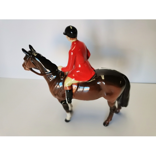 47 - Beswick huntsman standing four square on brown horse