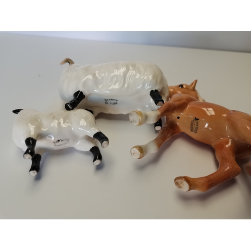 50 - Beswick sheep, Beswick lamb and Beswick comical foal in Palomino ( Small restoration on all 3)