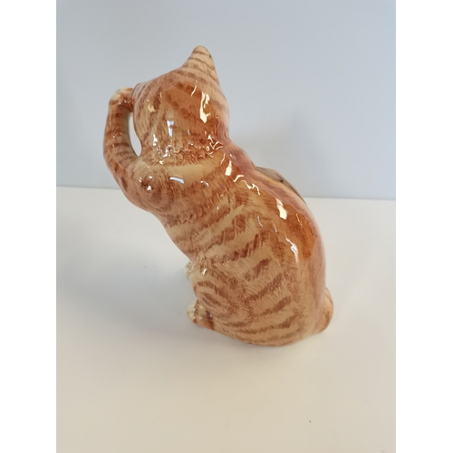 31 - Beswick Swiss roll Ginger Cat scratching ear No. 1877