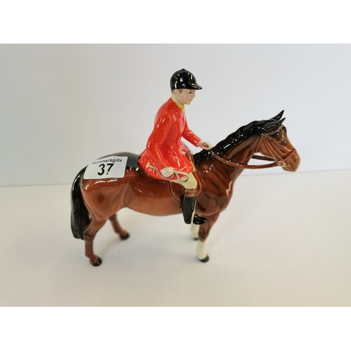 37 - Beswick huntsman standing four square on brown horse