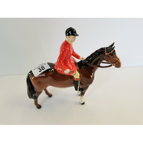 38 - Beswick huntsman standing four square on brown horse