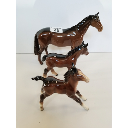 46 - Beswick huntsman's horse in brown, small shire foal in brown and large stretched foal in brown