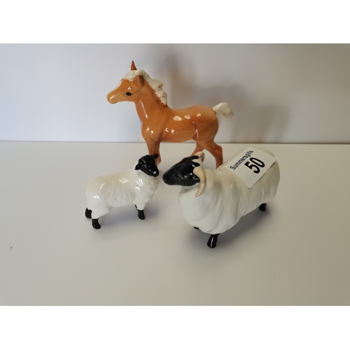 50 - Beswick sheep, Beswick lamb and Beswick comical foal in Palomino ( Small restoration on all 3)