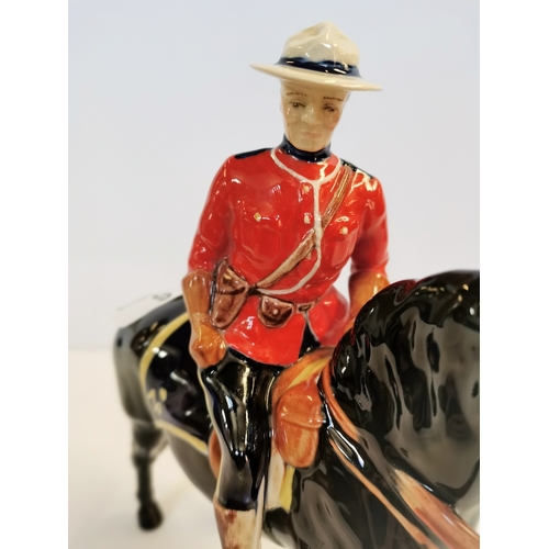 9 - Beswick Canadian Mountie on black horse