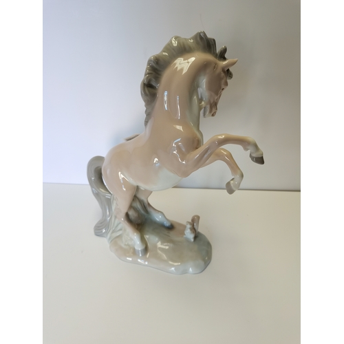 66 - Lladro horse and squirrel (no understamp but page out of Lladro book showing rarity)