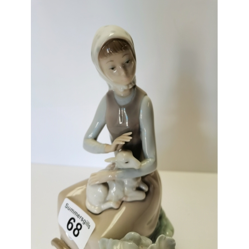 68 - Lladro girl with wheelbarrow and lamb on knee