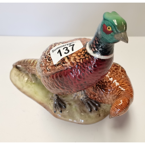 137 - Pair of Beswick Pheasants on ceramic plinth