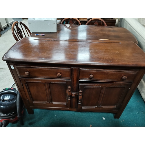 1070 - Ercol dining table, 4 chairs and sideboard