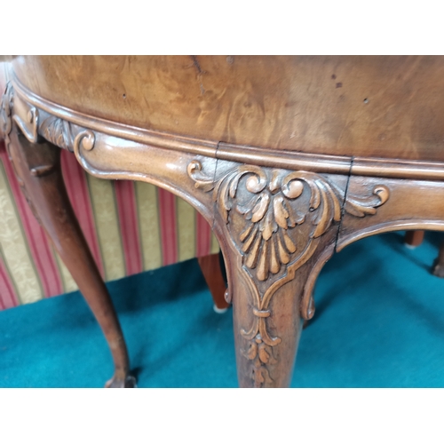 1071 - Quality carved games table with ball and claw feet (some water damage to top)