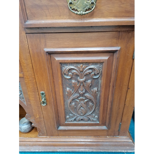 1046 - An Antique oak large Arts and Crafts style sideboard with mirror back and decorative panelling