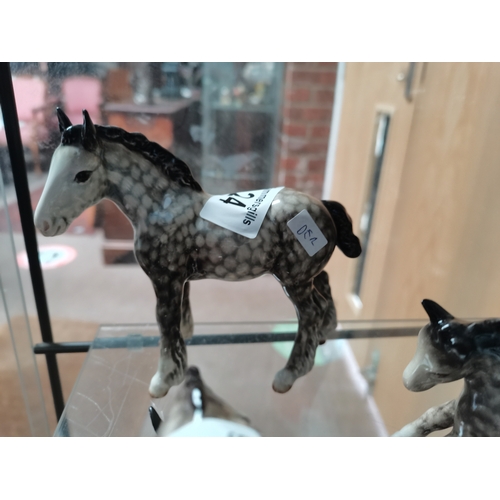 24 - Small Beswick shire foal in rocking horse grey