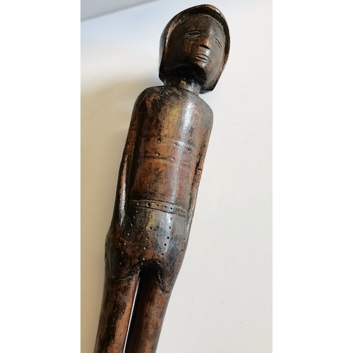 429 - Eqyptian pin head carved wooden club 80cm long