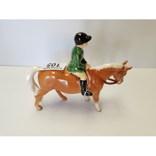 105 - Beswick Boy on Palomino pony with dark green jacket (minute repair on left ear)